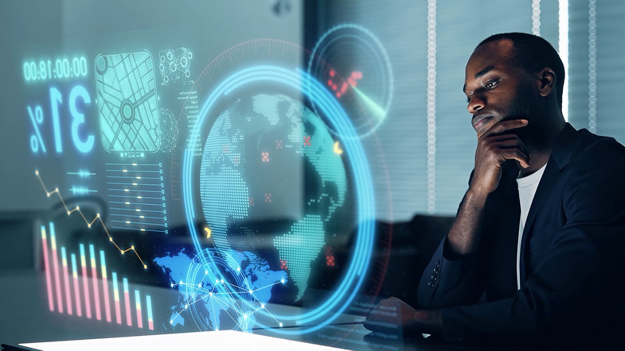 Man looking at a virtual computer display